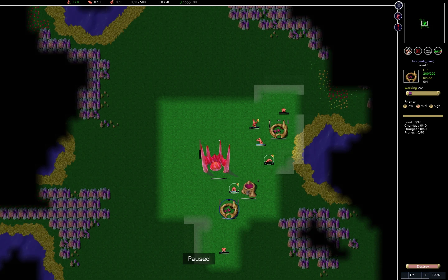 Two completed inns, the lower selected with Food 0/10, two attached workers carrying wheat across the colony.